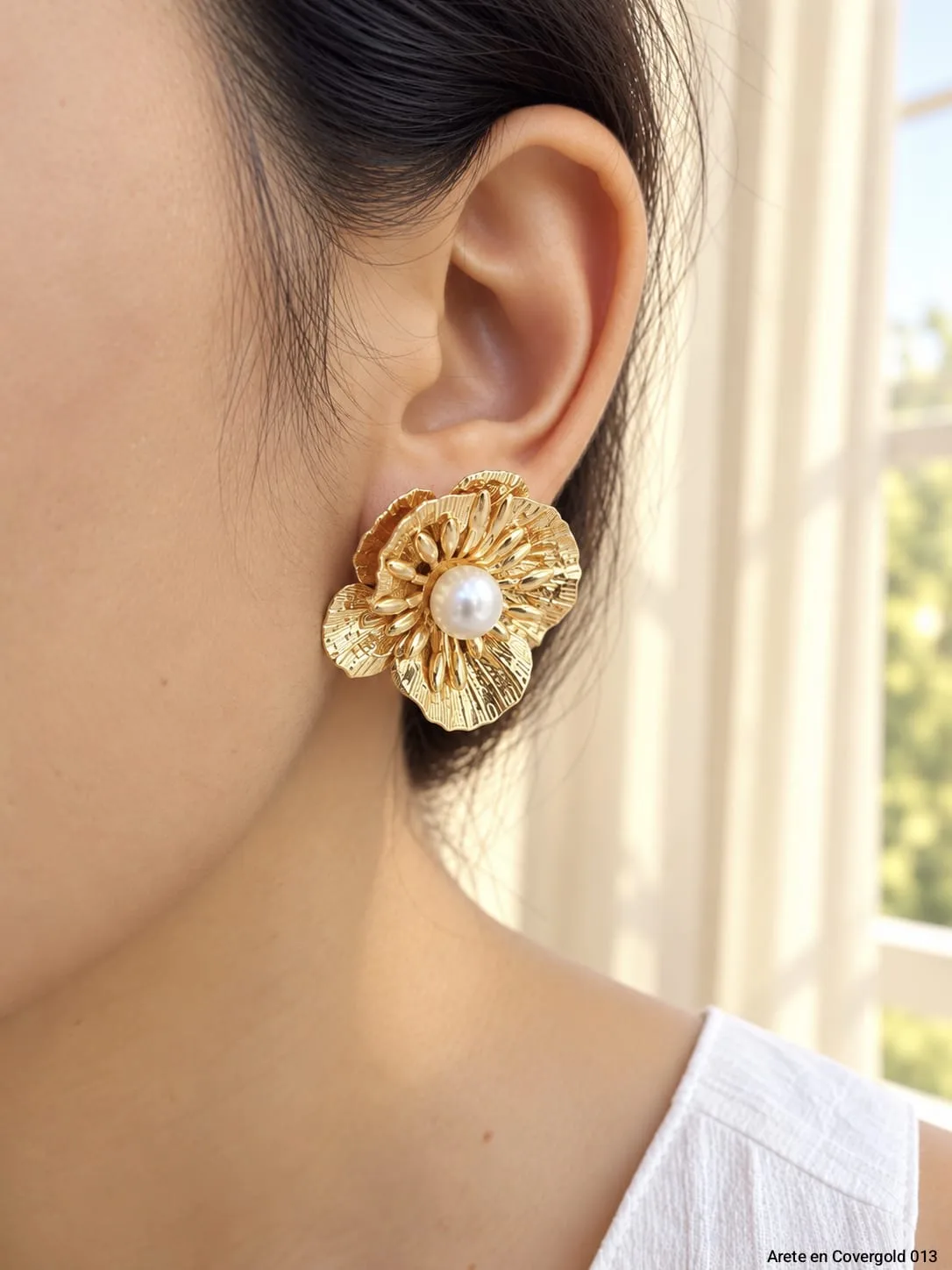 arete flor relieve — foto 1 de 4