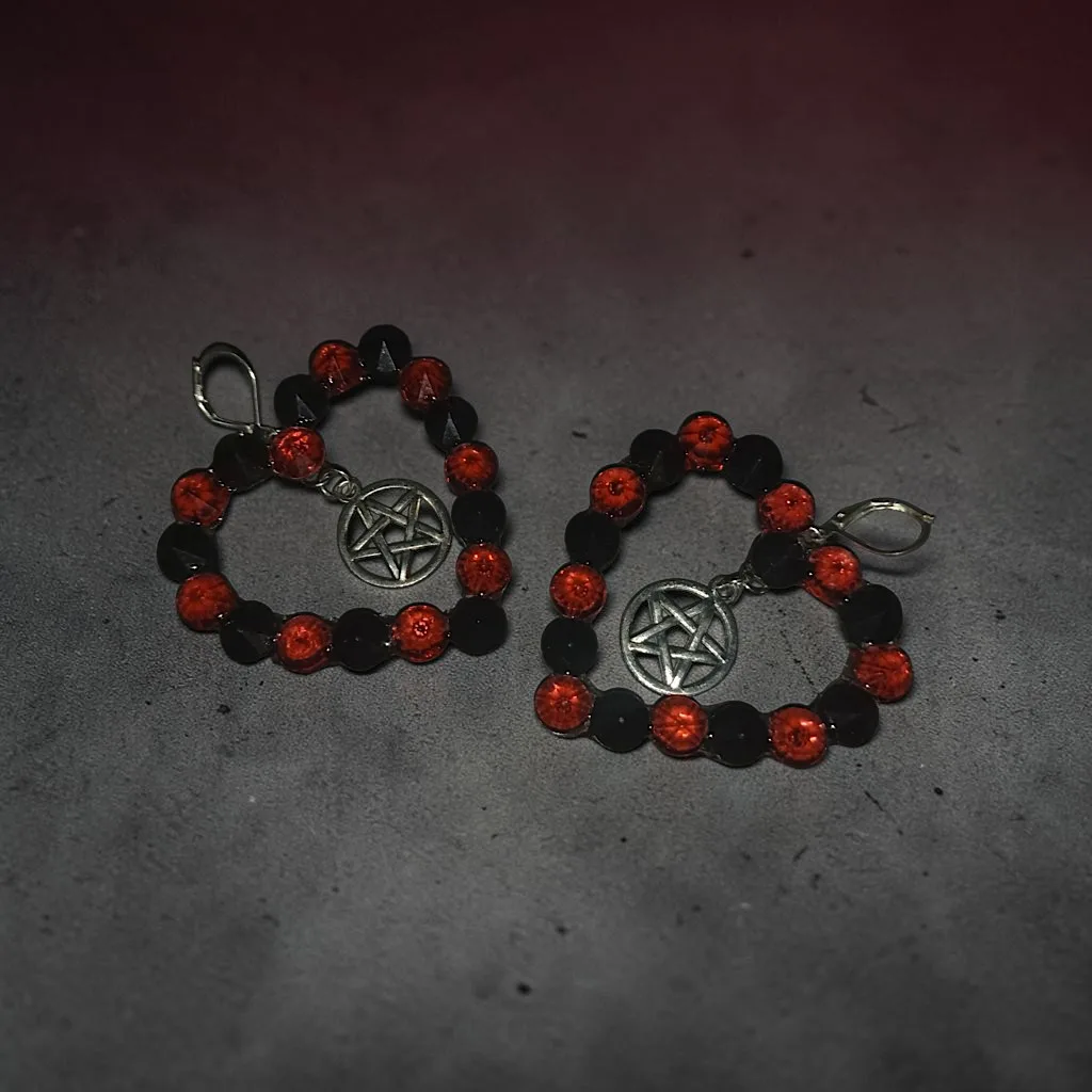 Aretes pedrería corazón pentagrama — foto 3 de 4