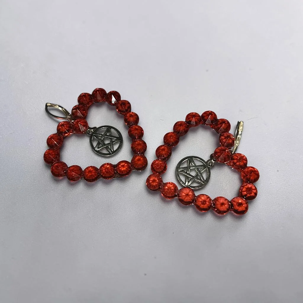 Aretes pedrería corazón pentagrama — foto 2 de 4