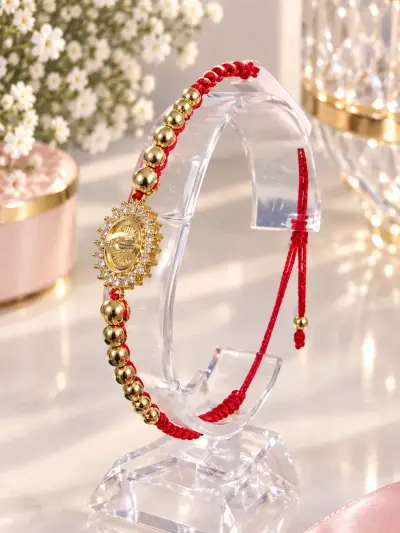 Manilla roja con la virgen de rodio