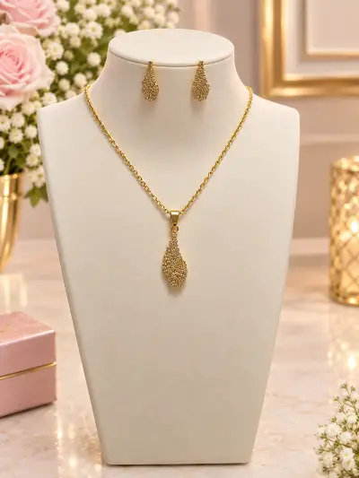 Cadena y aretes alas