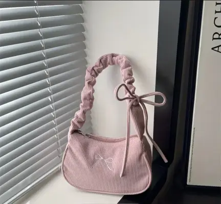 Bolso de pana rosado